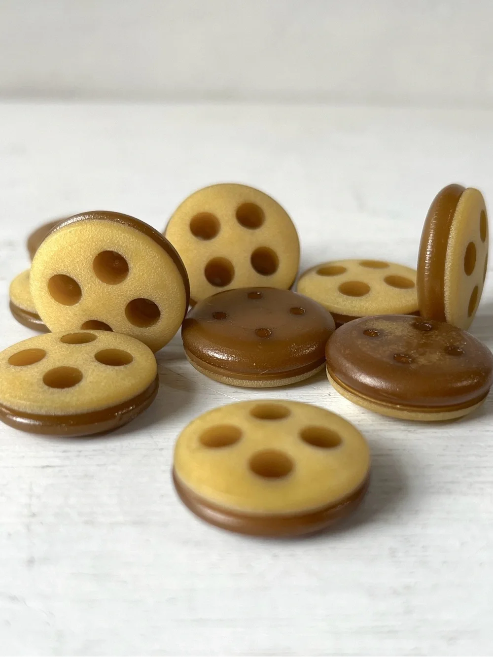 11 Unusual Vintage Round Plastic 4 hole Buttons w Groove Offbeat Yellow Ochre